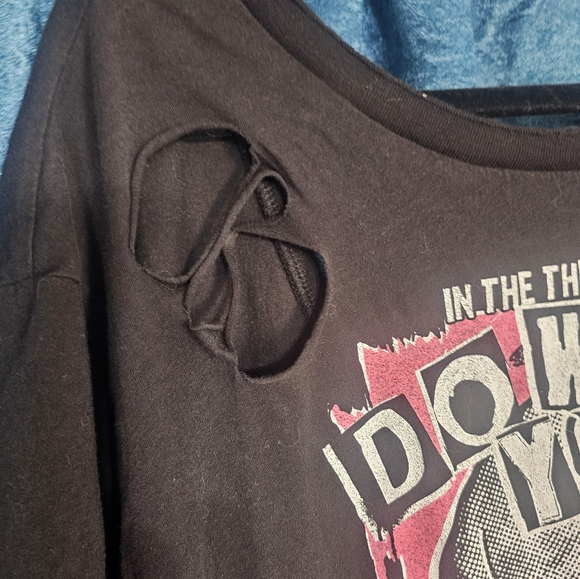 Torrid Distressed Open Back Black Graphic Tee with Skull Design - Picture 2 of 4